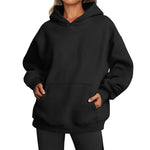 Black hoodie worn by a person on a white background