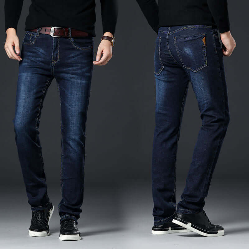 Person wearing blue jeans from front and back views on a gray background