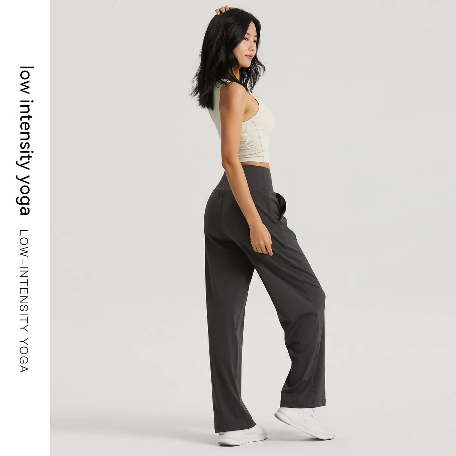 Model wearing VexoFinds women's moisture-wicking wide-leg pants for low-intensity yoga in a comfortable pose.