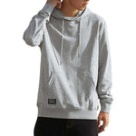 Gray hoodie worn by a person on a white background