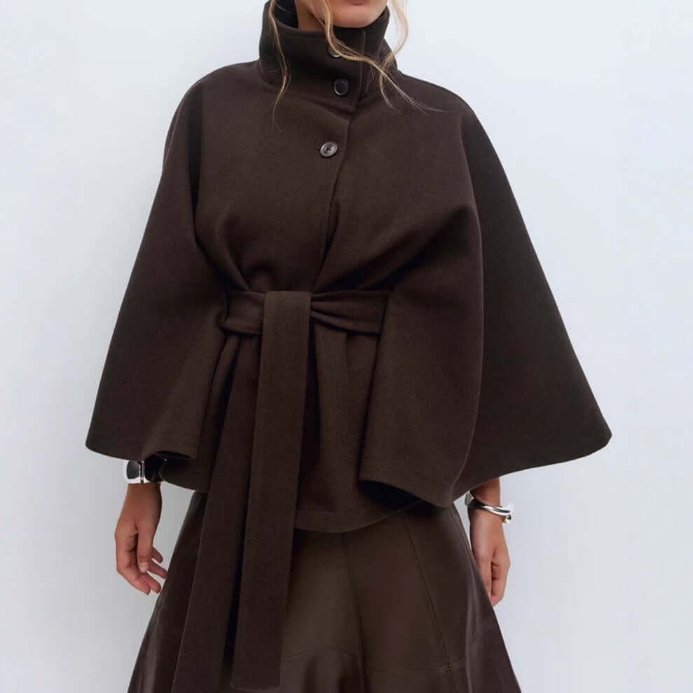Winter batwing sleeve coat featuring a high neck and stylish belt, perfect for an elegant winter look.