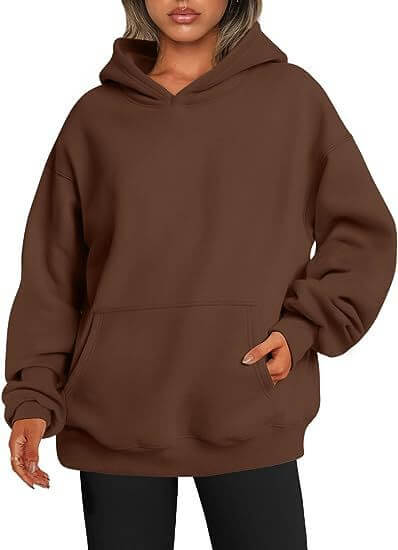 Brown hoodie worn by a person on a white background