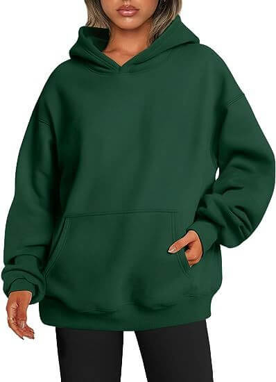Green hoodie worn by a person on a white background