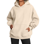 Beige hoodie worn by a person on a white background