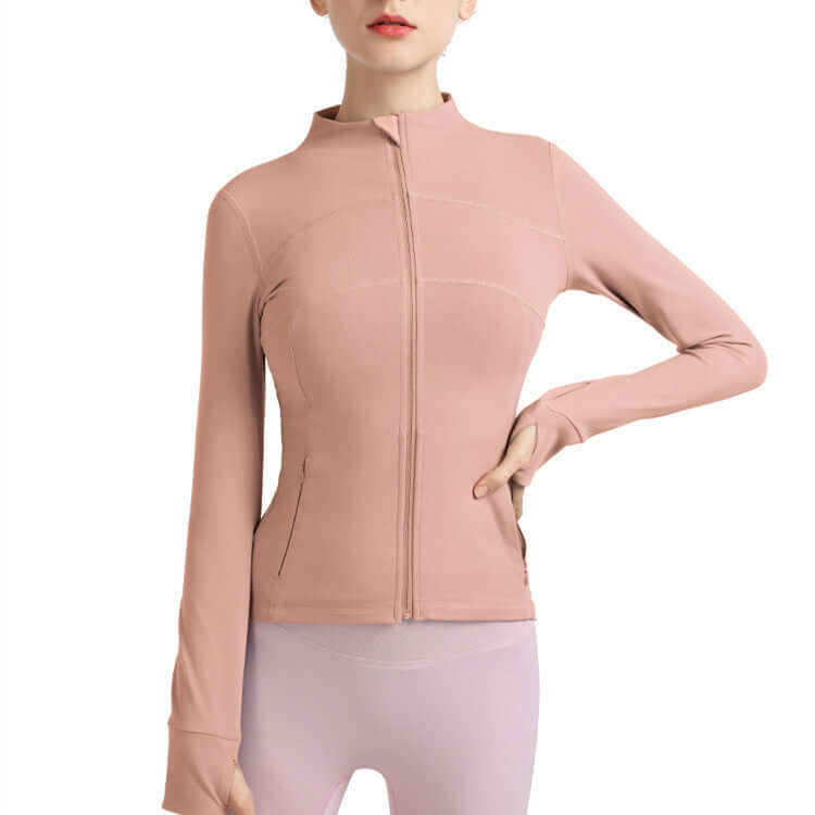 Pink athletic jacket worn by a person on a white background
