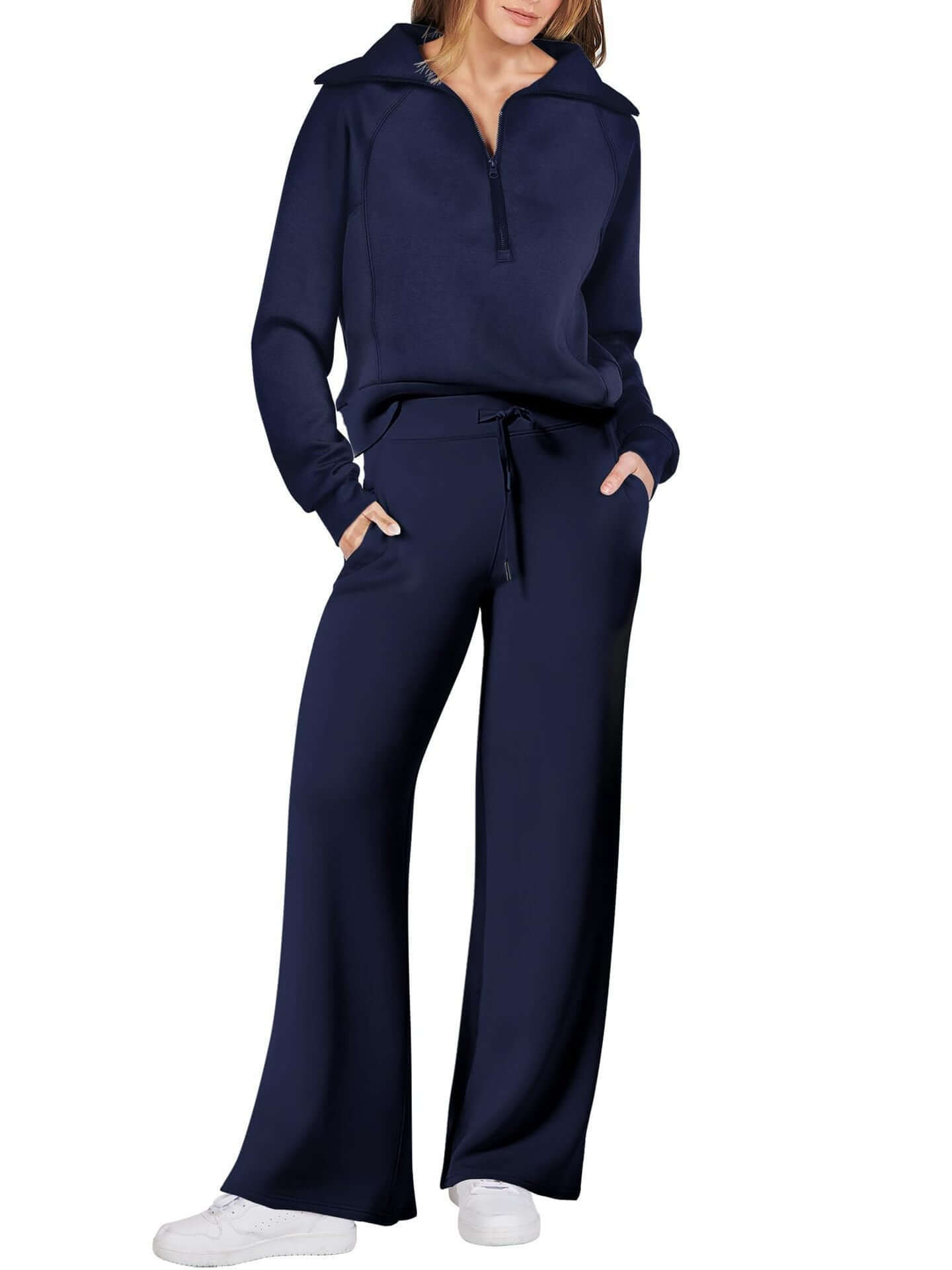 Women’s sports suit with wide-leg pants featuring a relaxed-fit top and loose-fit design in navy blue.