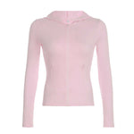 Pink long-sleeve top with a zipper on a white background